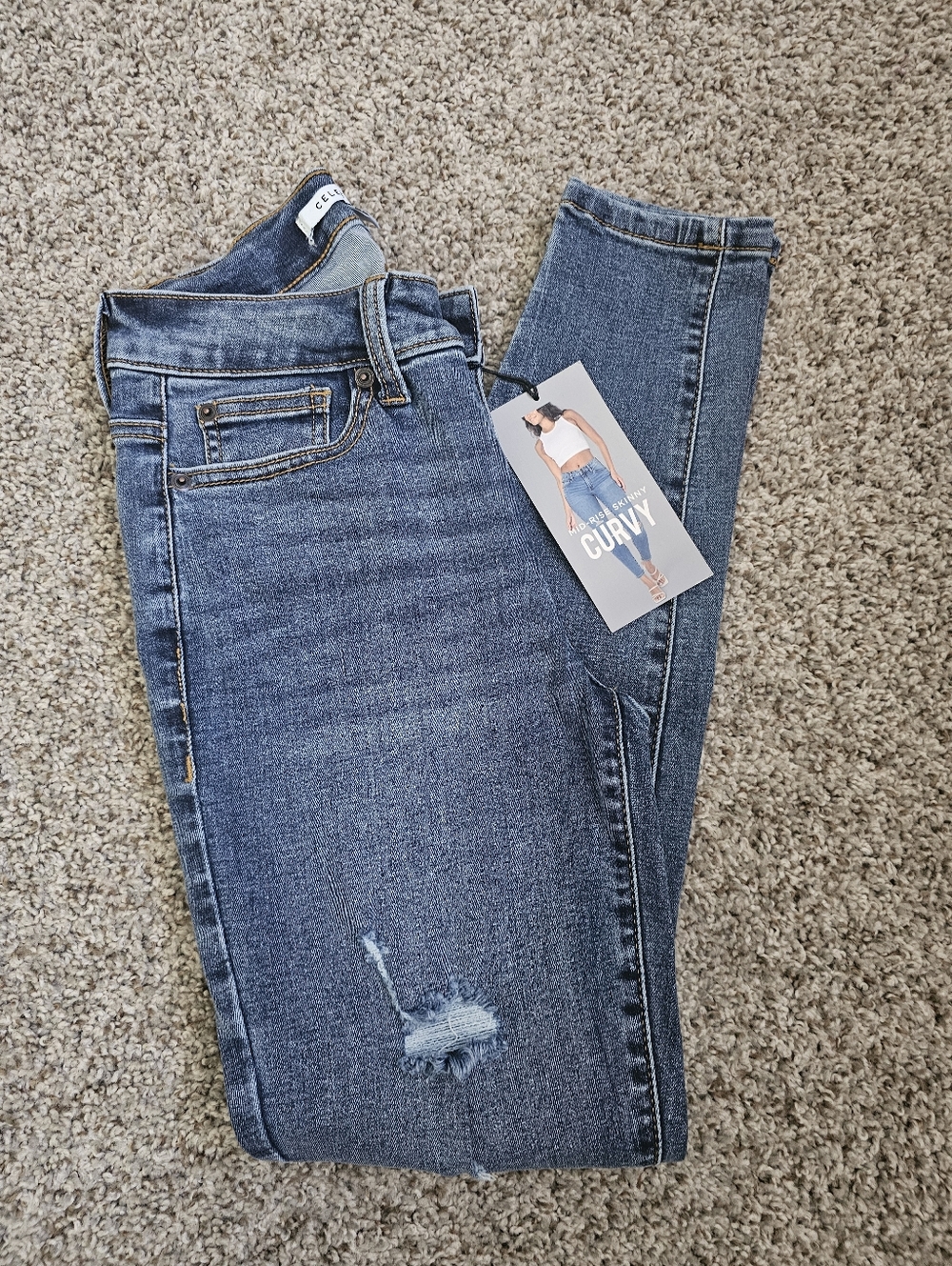 MID-RISE SKINNY JEANS